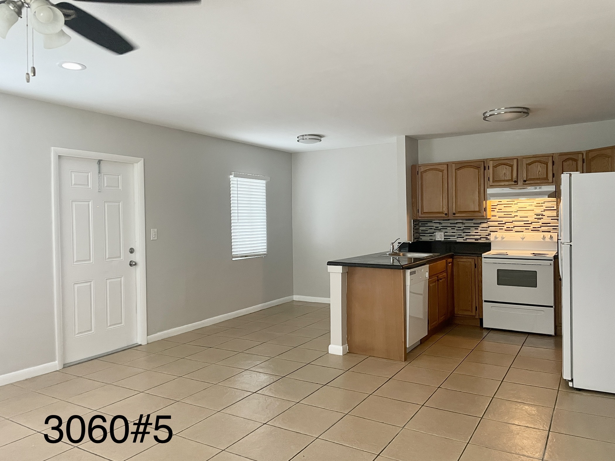 3060 NE 13TH AVE